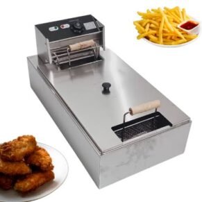 a machine with a fryer and a plate of chicken wings